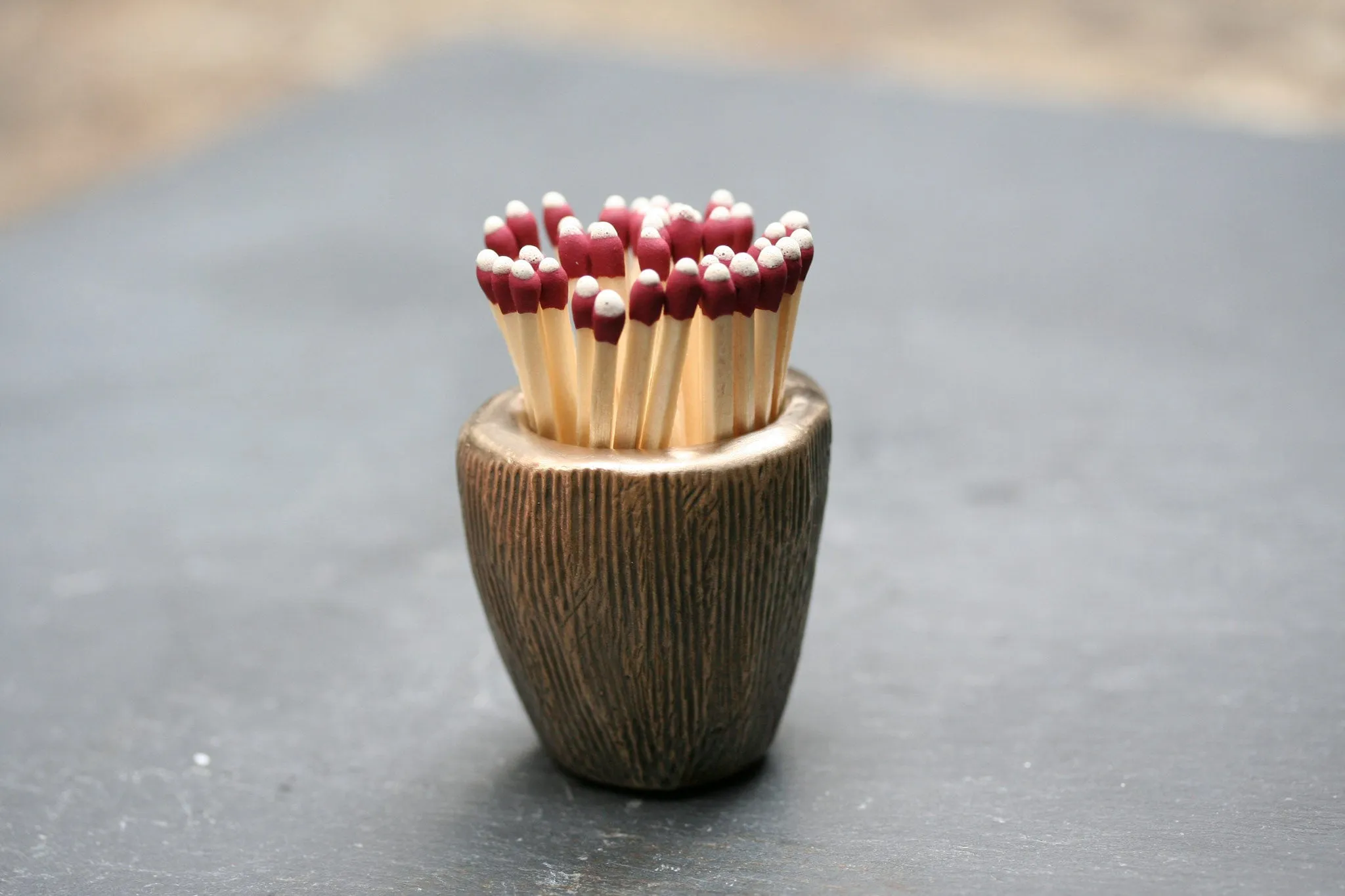 Basalt Matchstick Holder, Bronze