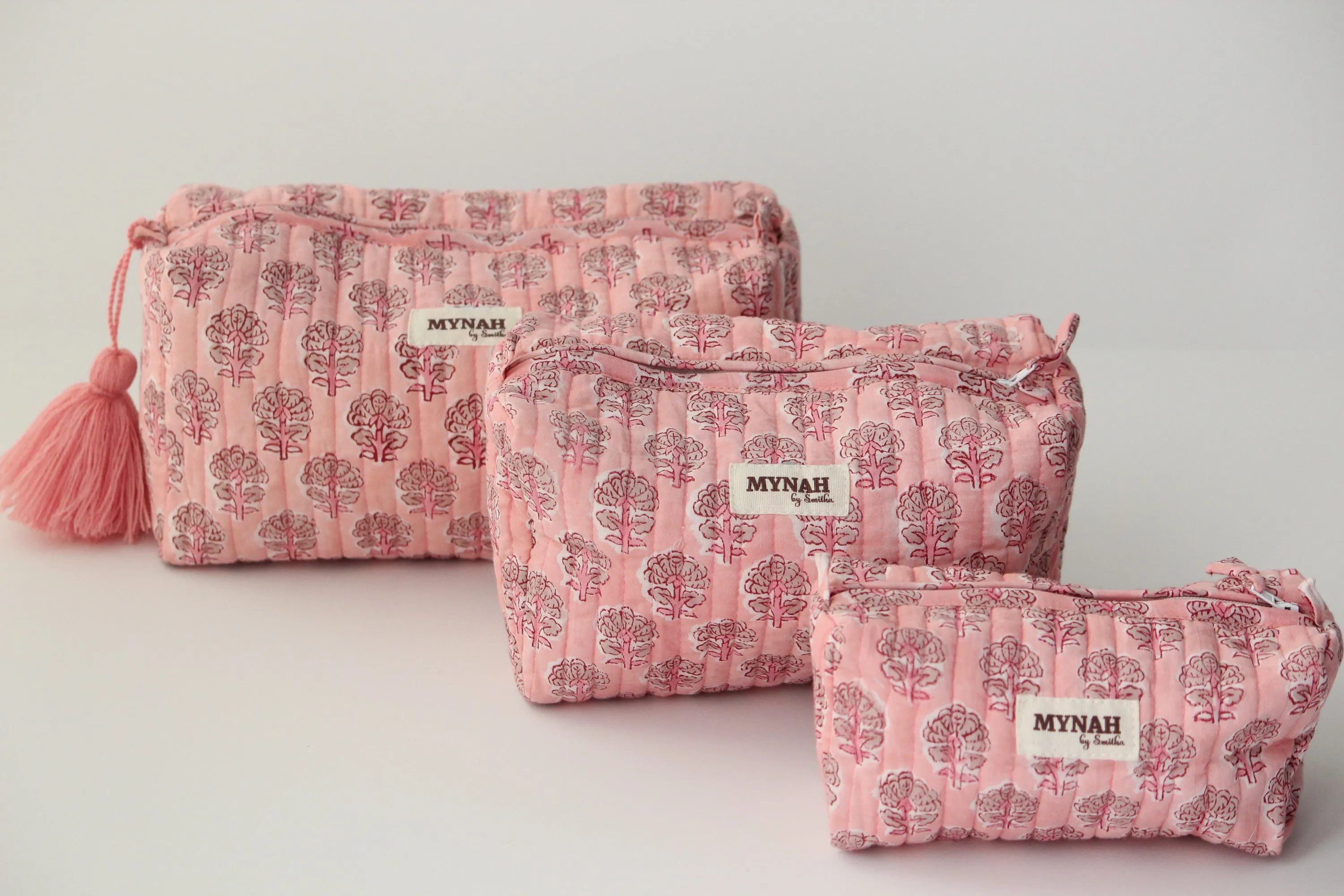 'BLUSH BLOOMS' blush pink with beige motifs' printed travel/makeup zipper pouch-set of 3