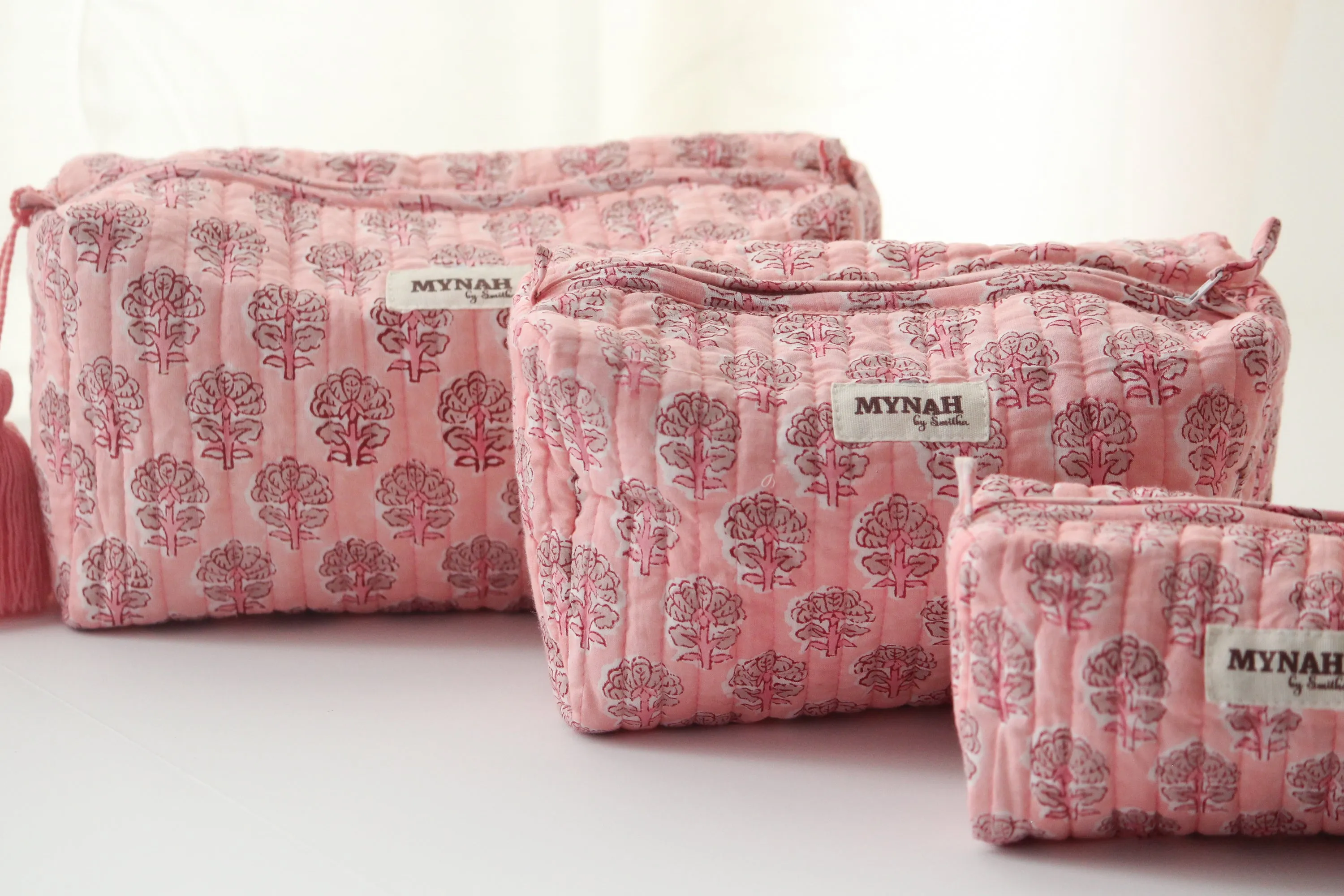 'BLUSH BLOOMS' blush pink with beige motifs' printed travel/makeup zipper pouch-set of 3