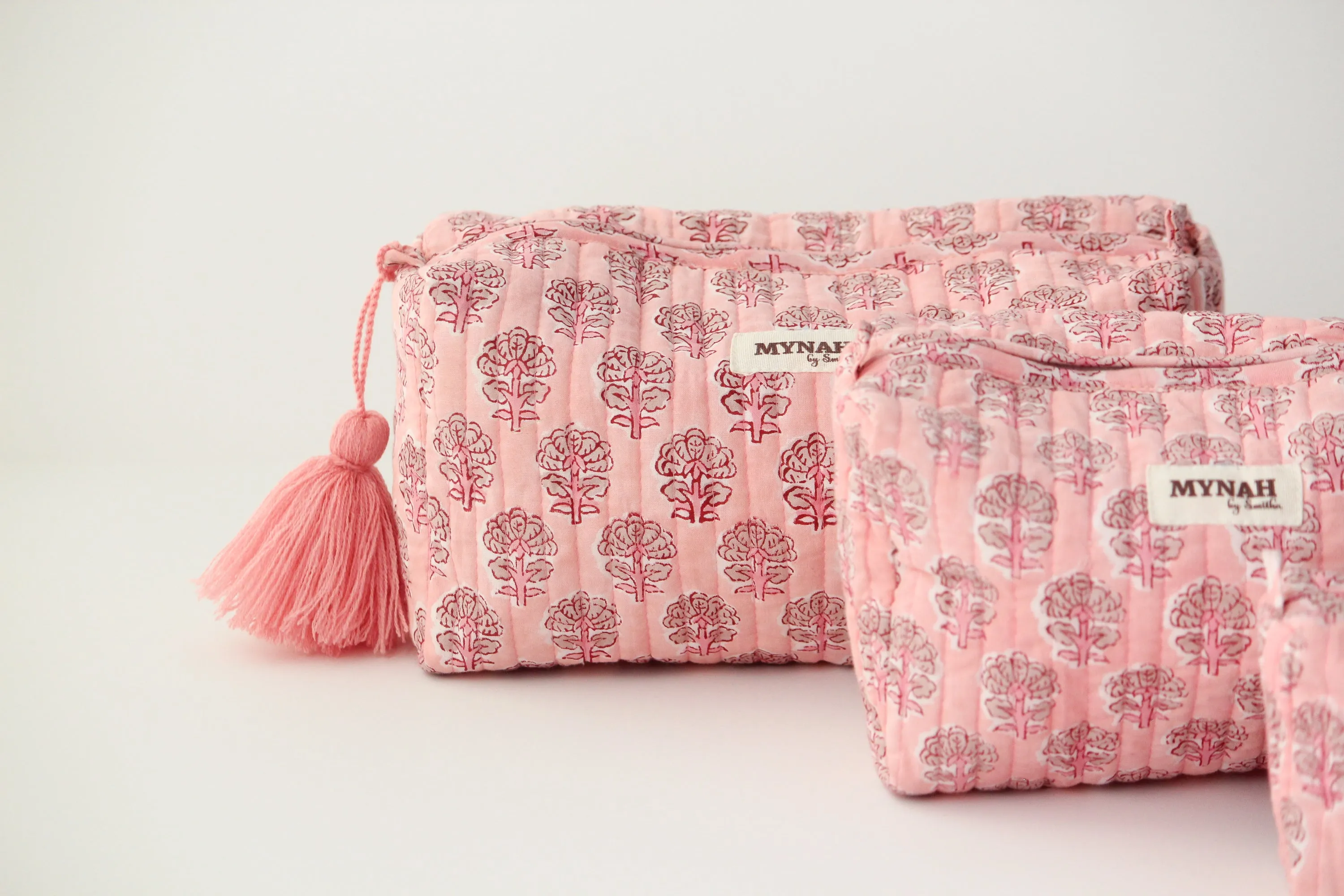 'BLUSH BLOOMS' blush pink with beige motifs' printed travel/makeup zipper pouch-set of 3