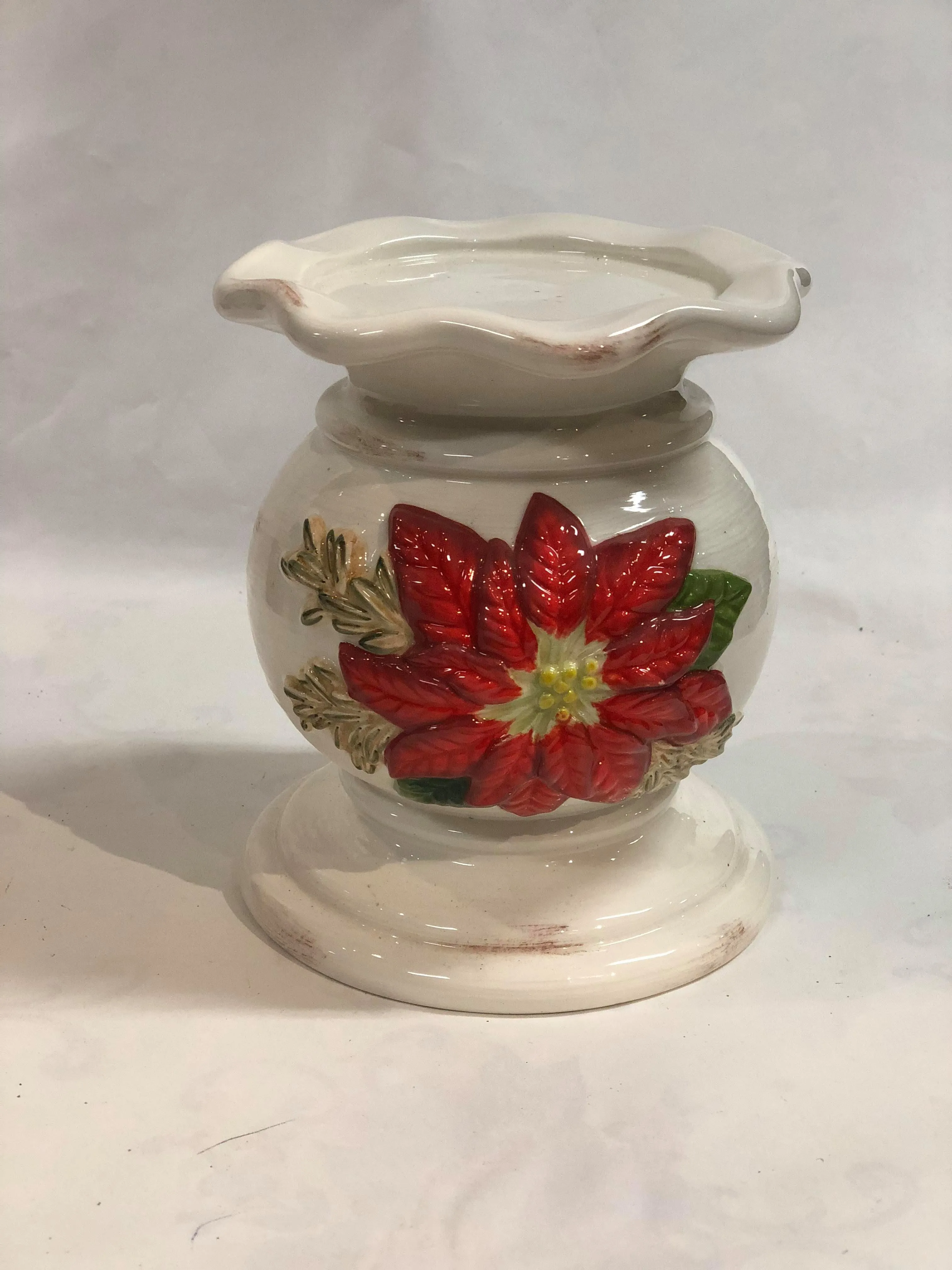 Ceramic poinsettia candle holder